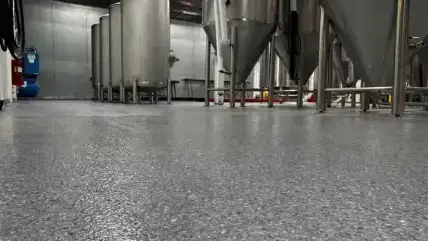 Commercial gray flake epoxy brewery floor — epoxy flooring near me in Sarasota, FL