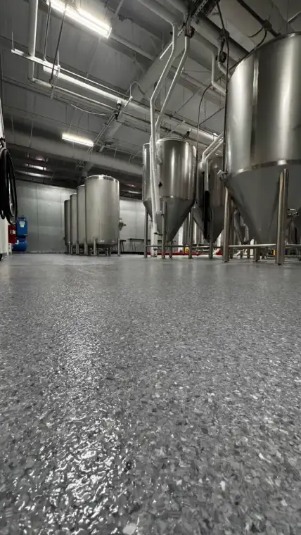 Gray flake commercial brewery epoxy floor — epoxy flooring near me in Parrish, FL