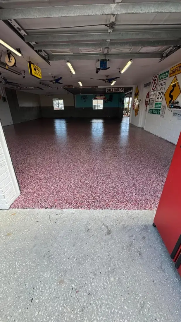 Red and white flake epoxy garage floor — epoxy flooring near me in Ruskin, FL