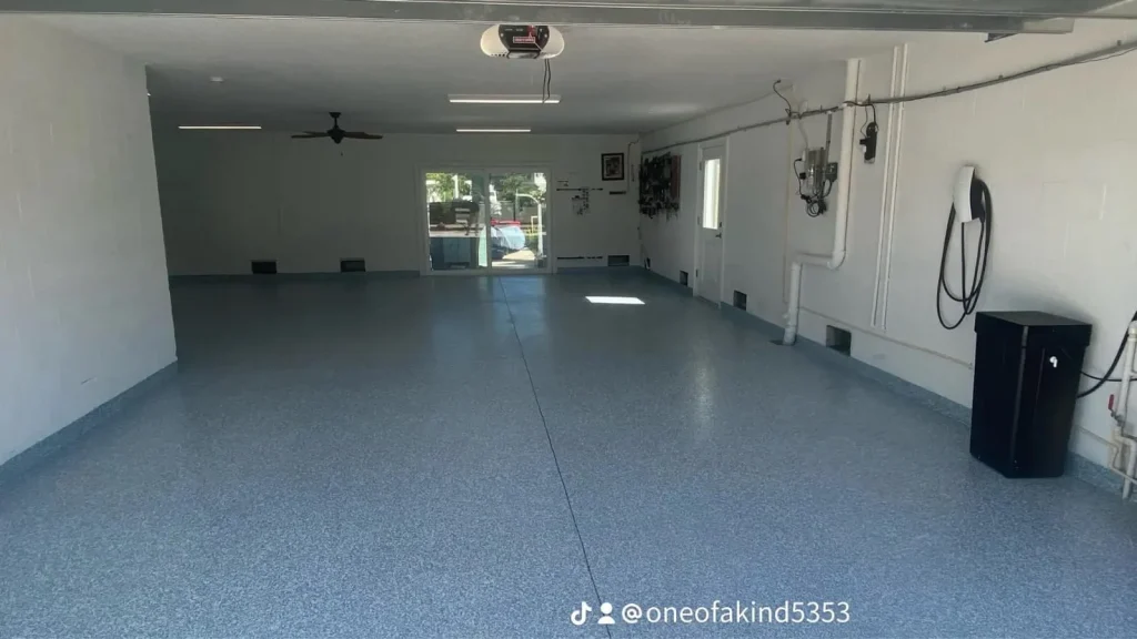 Blue-gray flake garage floor coating in a Sarasota-area home