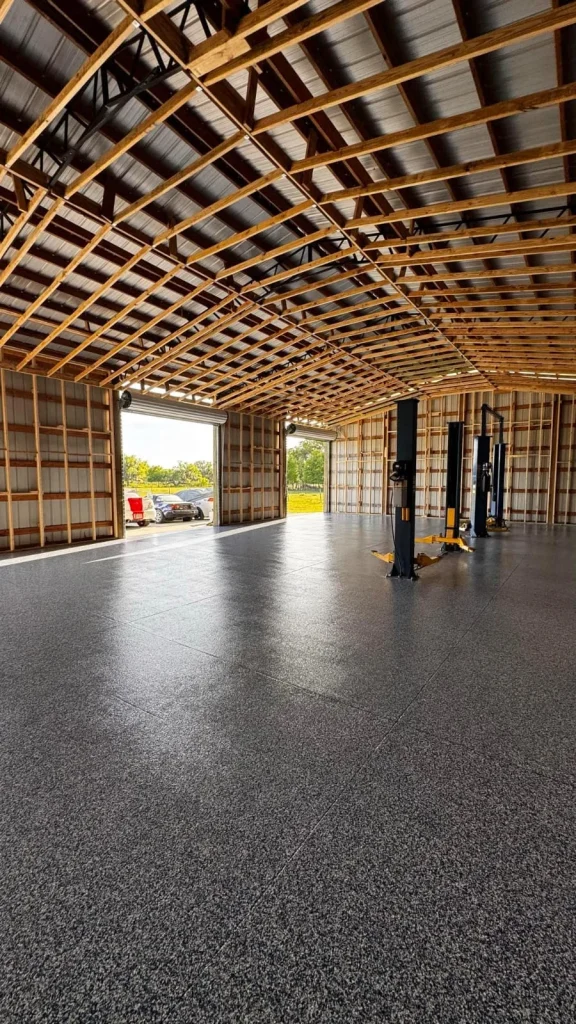 Coated concrete floor under a large covered outdoor pavilion