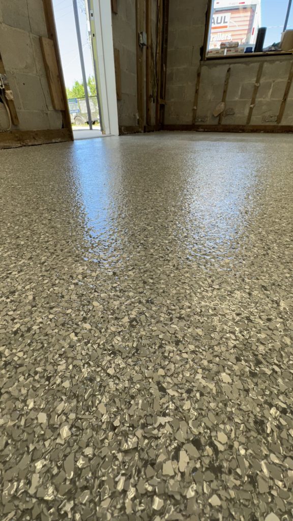 Flake epoxy floor in a new-construction garage near Ruskin, FL